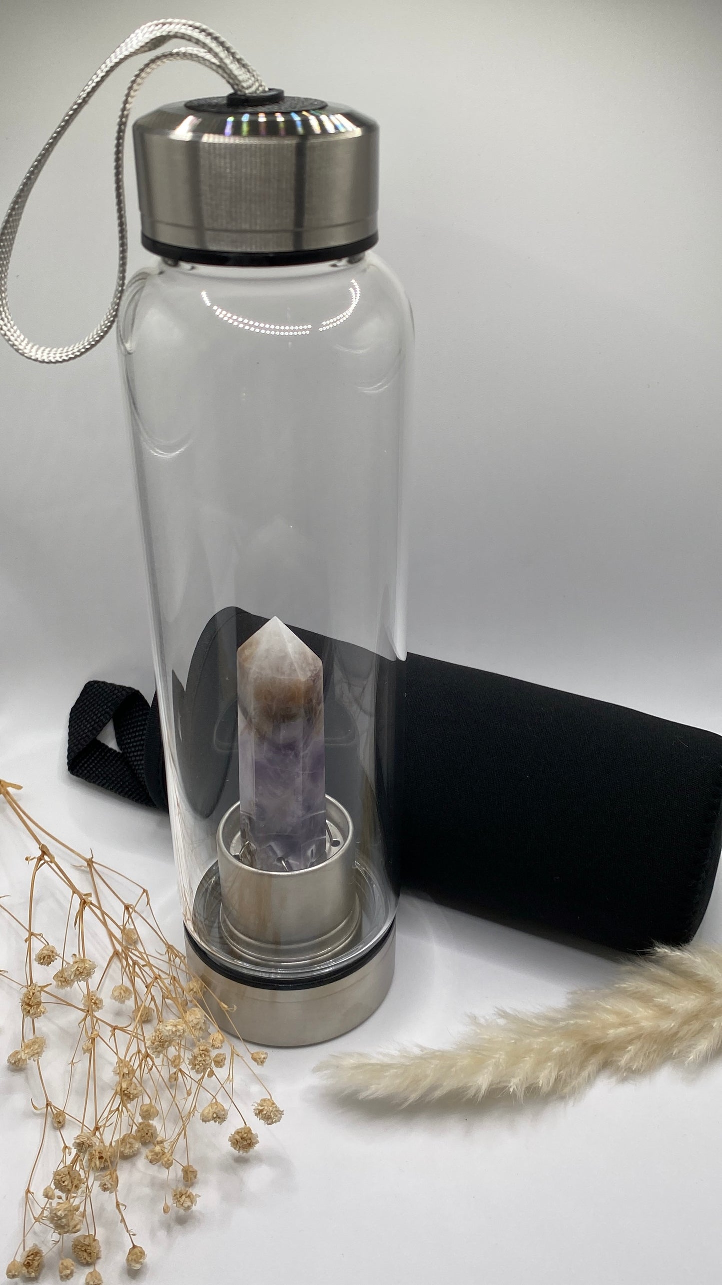 Flasche aus Glas mit Mineralien Amethyst